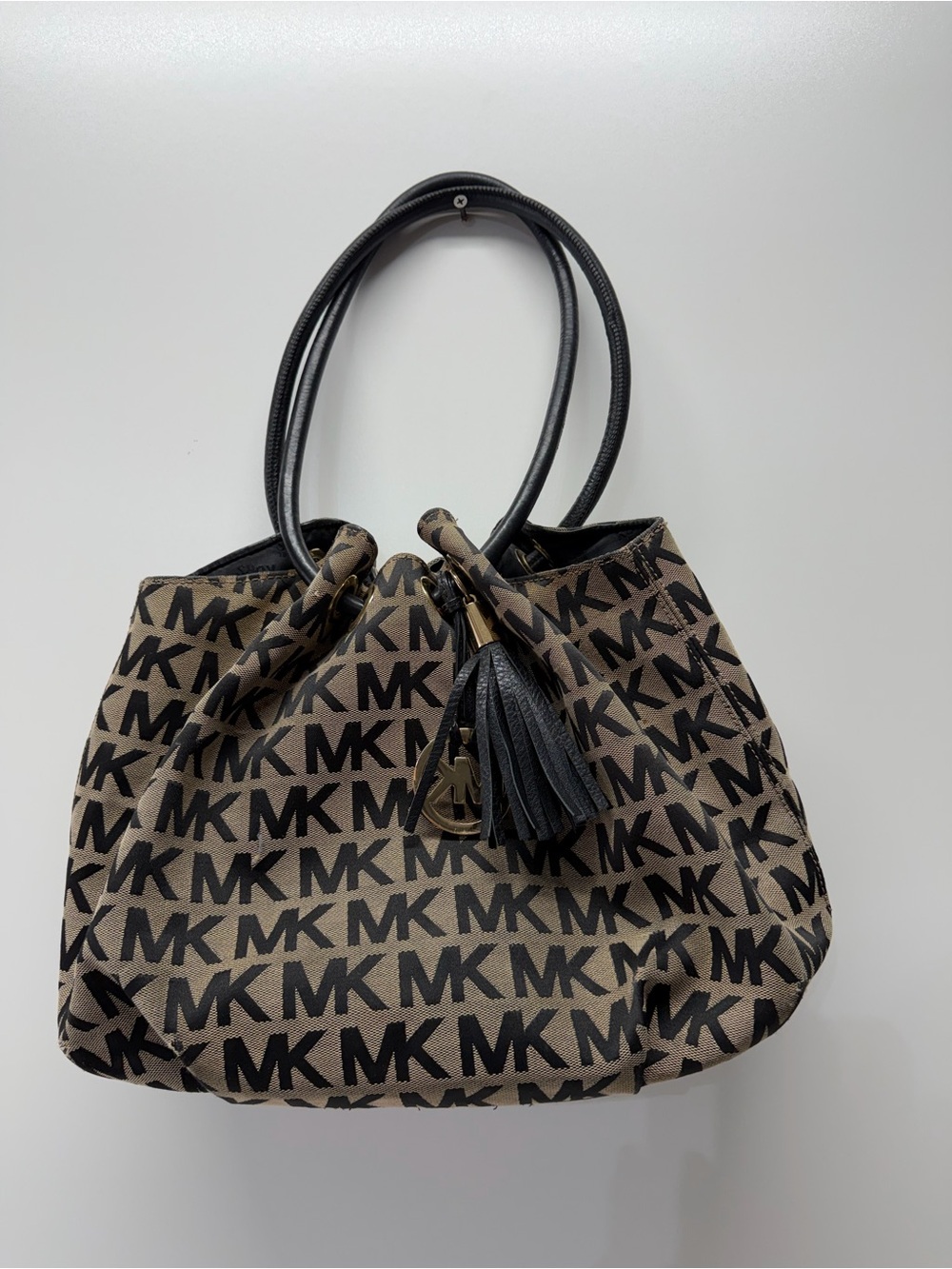 Michael Kors Black and Brown MK Logo Tote with Tassel Charm